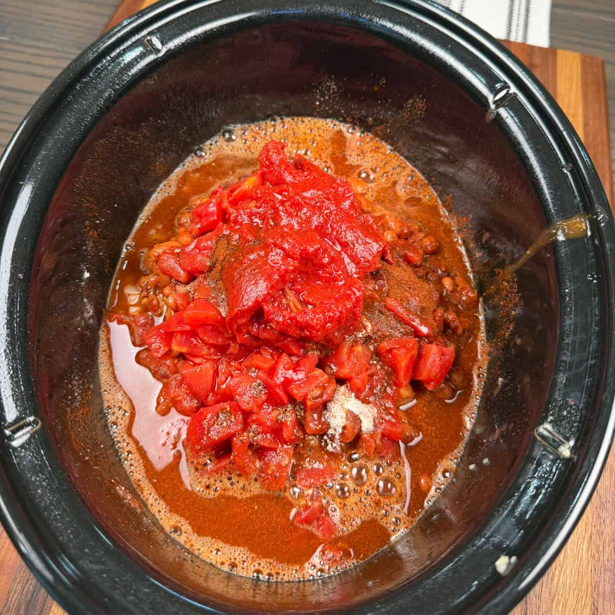 chili ingredients in crockpot