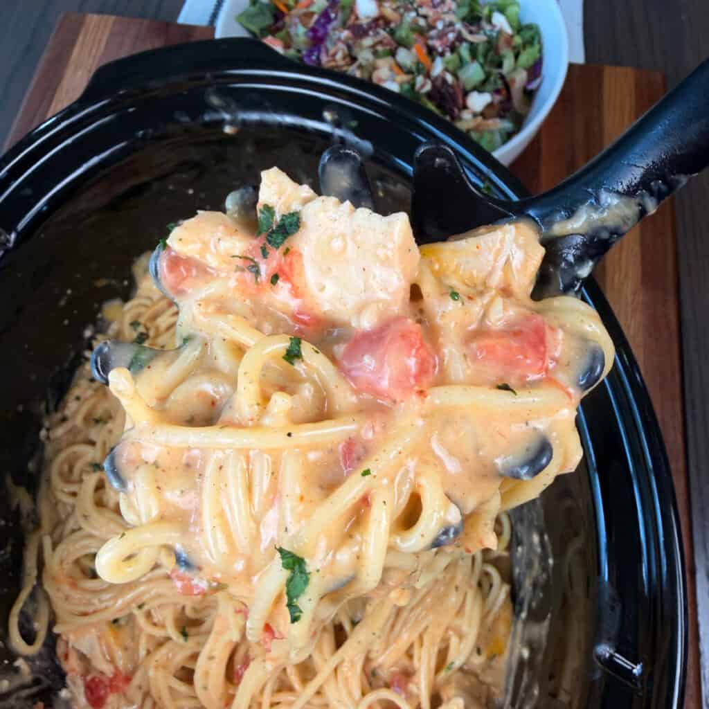 Up close shot of Chicken Spaghetti in crockpot 