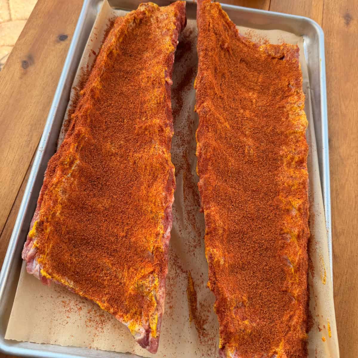 Baby Back Ribs seasoned with BBQ rub