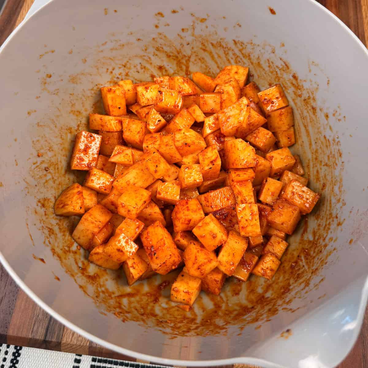 Seasoned  russet potatoes in bowl