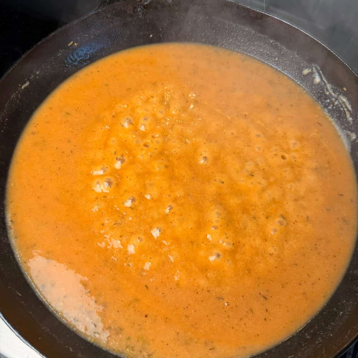 Gravy bubbling in skillet