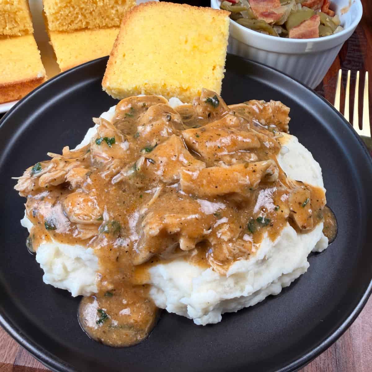 Easy Chicken and Gravy with mashed potatoes and cornbread