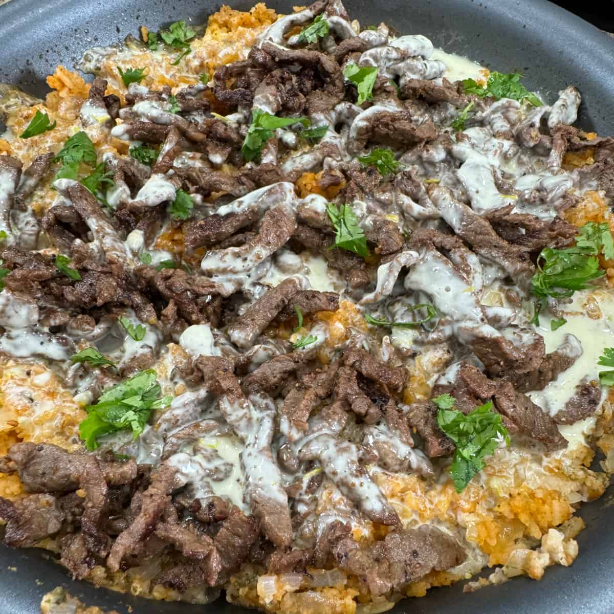 steak-cheese-and-rice-cooking-in-the-midwest