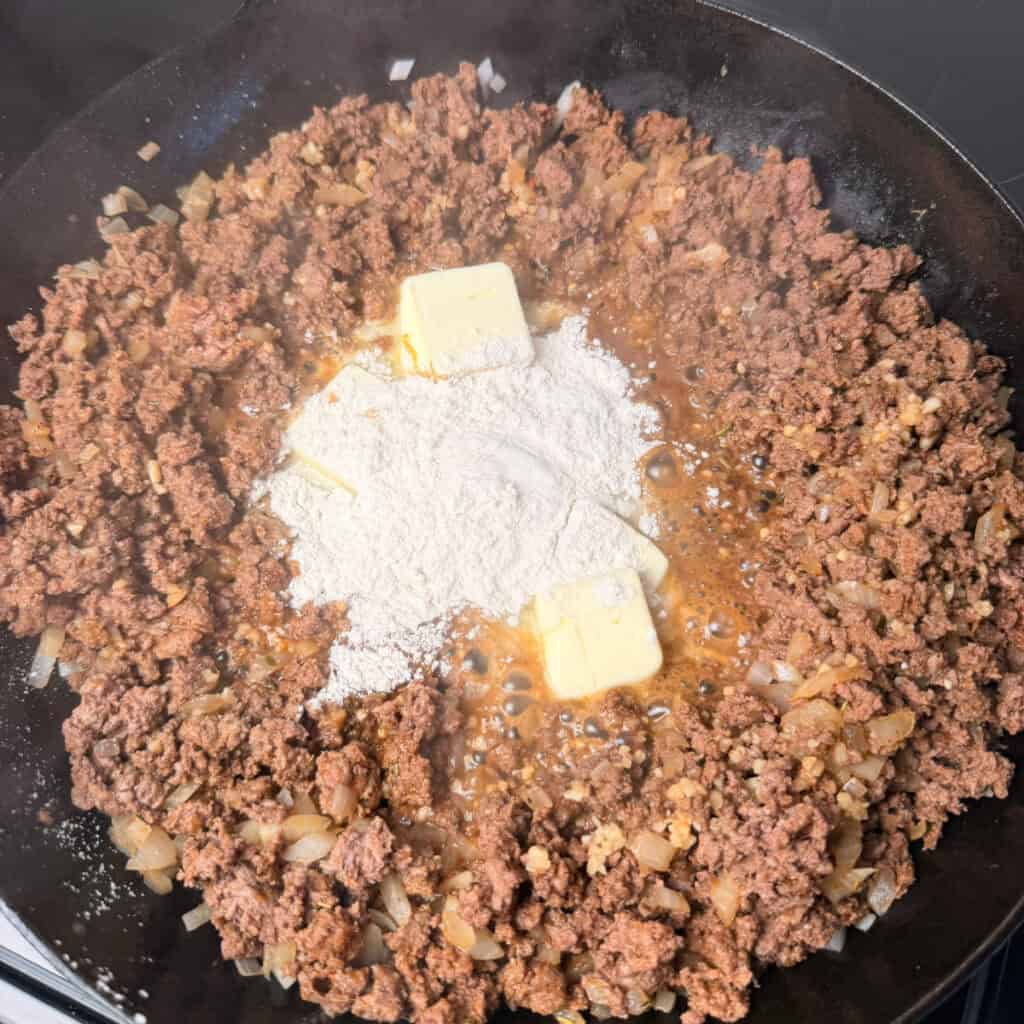 Browned beef, butter, and flour in skillet