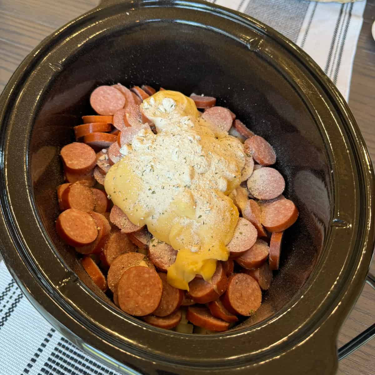 Crockpot Cheesy Potatoes and Kielbasa - Cooking in the Midwest