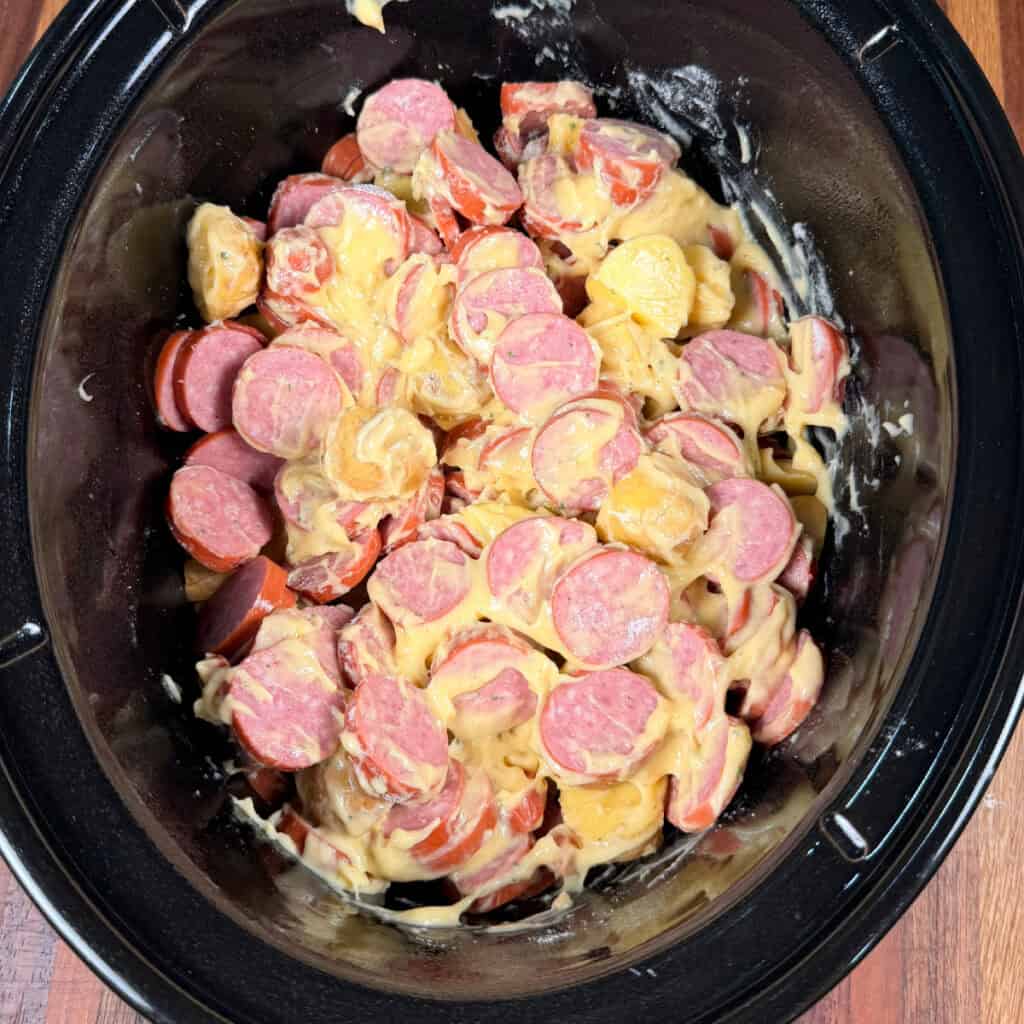 Crockpot with baby potatoes, smoked sausage, cream of chicken soup