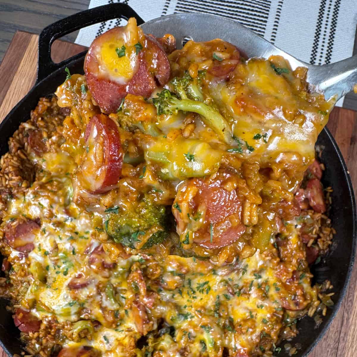 Cheesy Smoked Sausage and Rice Skillet