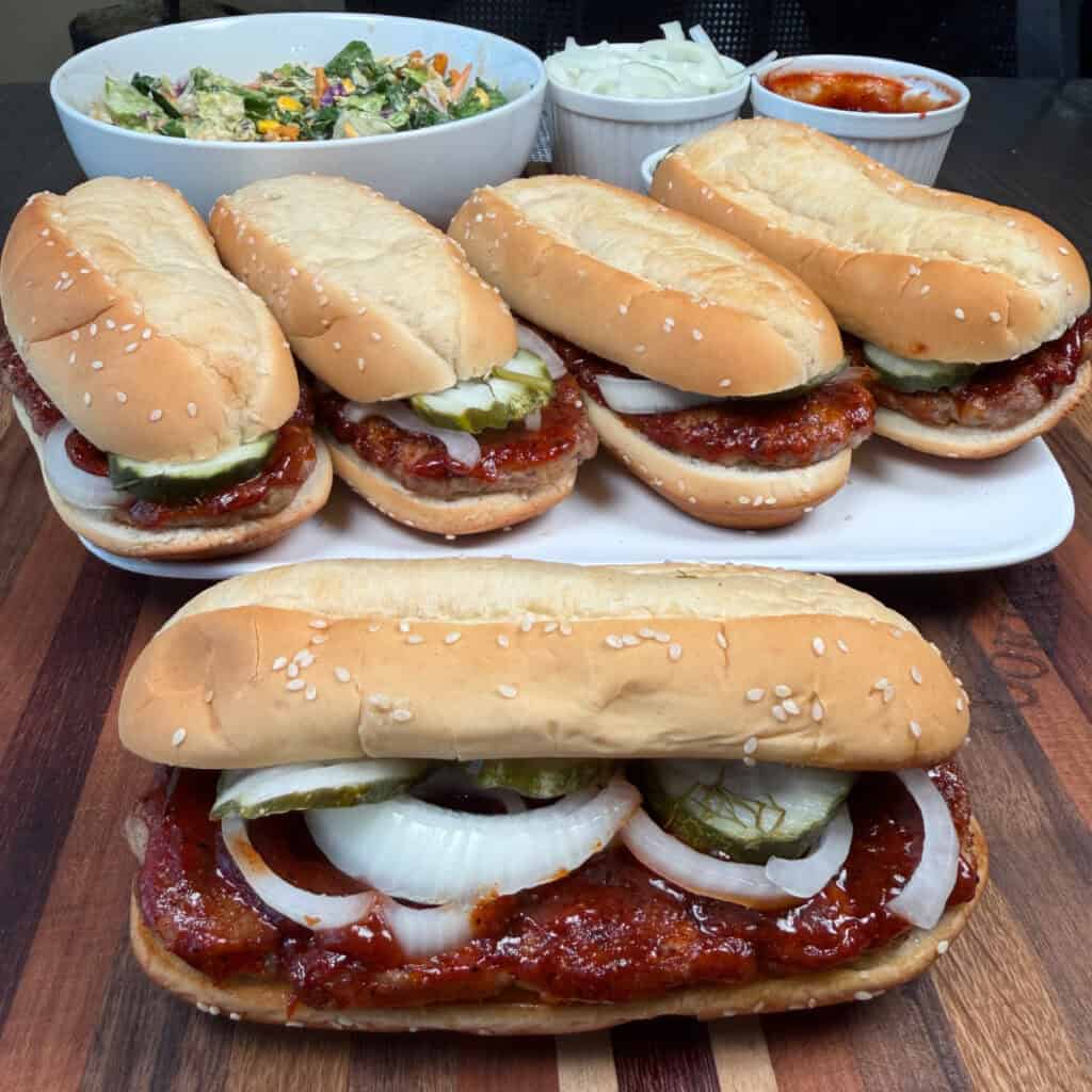 5 McRib Sandwiches with a salad in a bowl