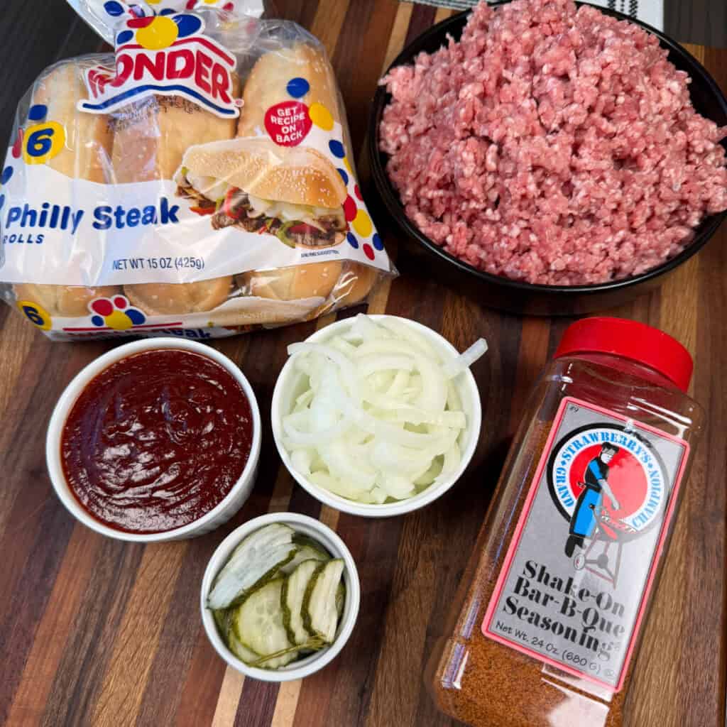 Homemade McRib Ingredients Hoagie Rolls, ground pork, onions, sauce, pickles, BBQ seasoning