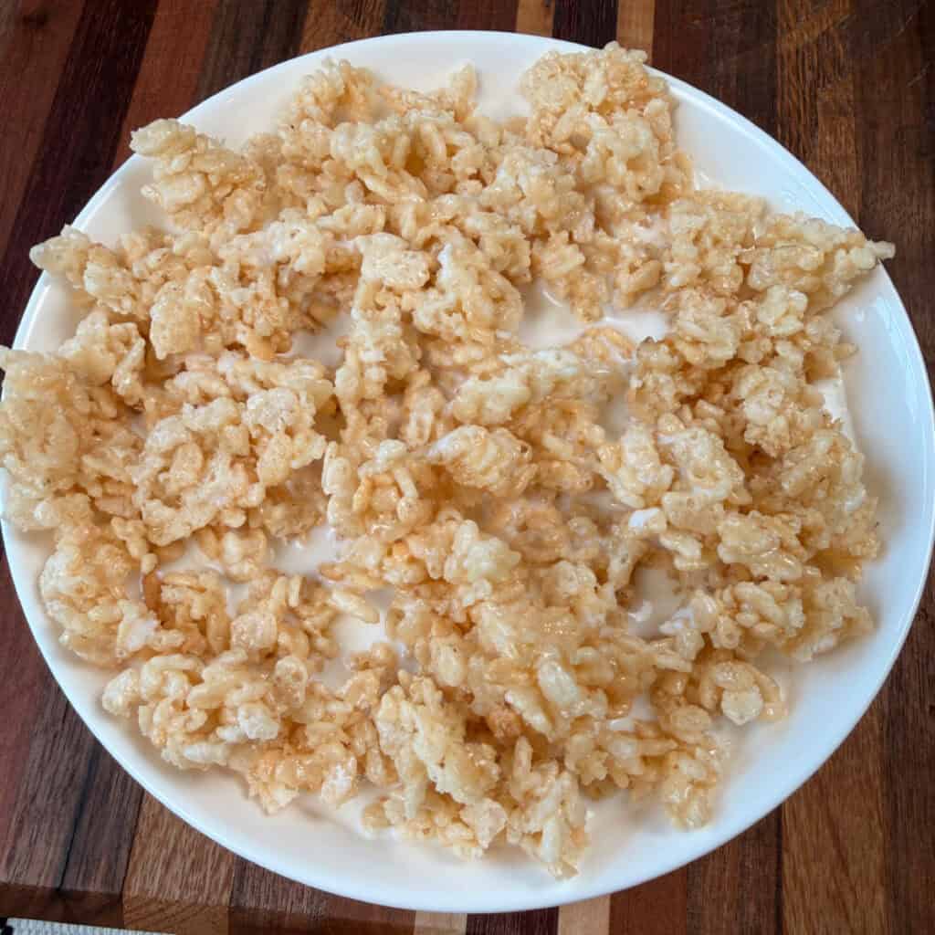 Bowl of Rice Krispies Treats Cereal with milk