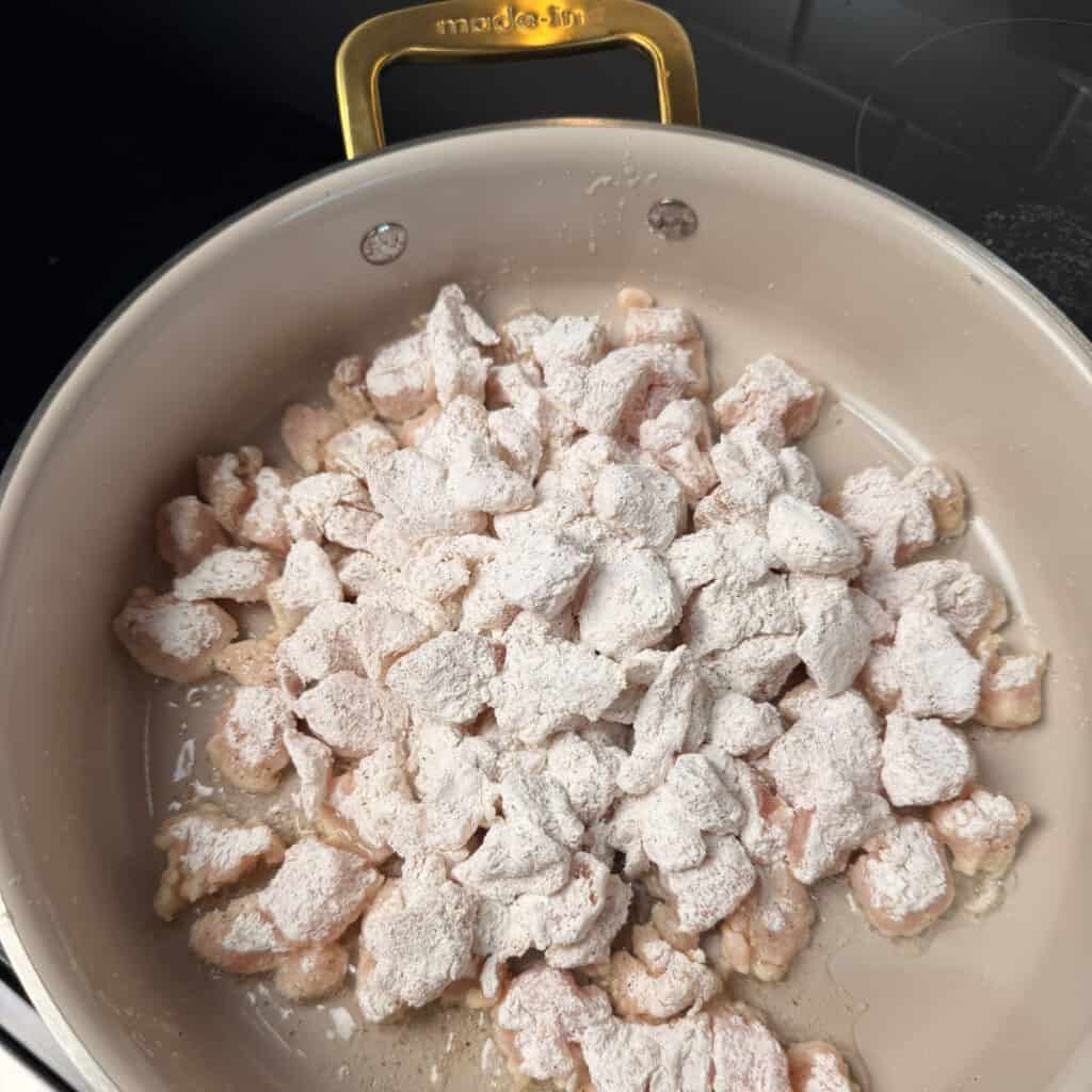Chicken coated in cornstarch and seasoning