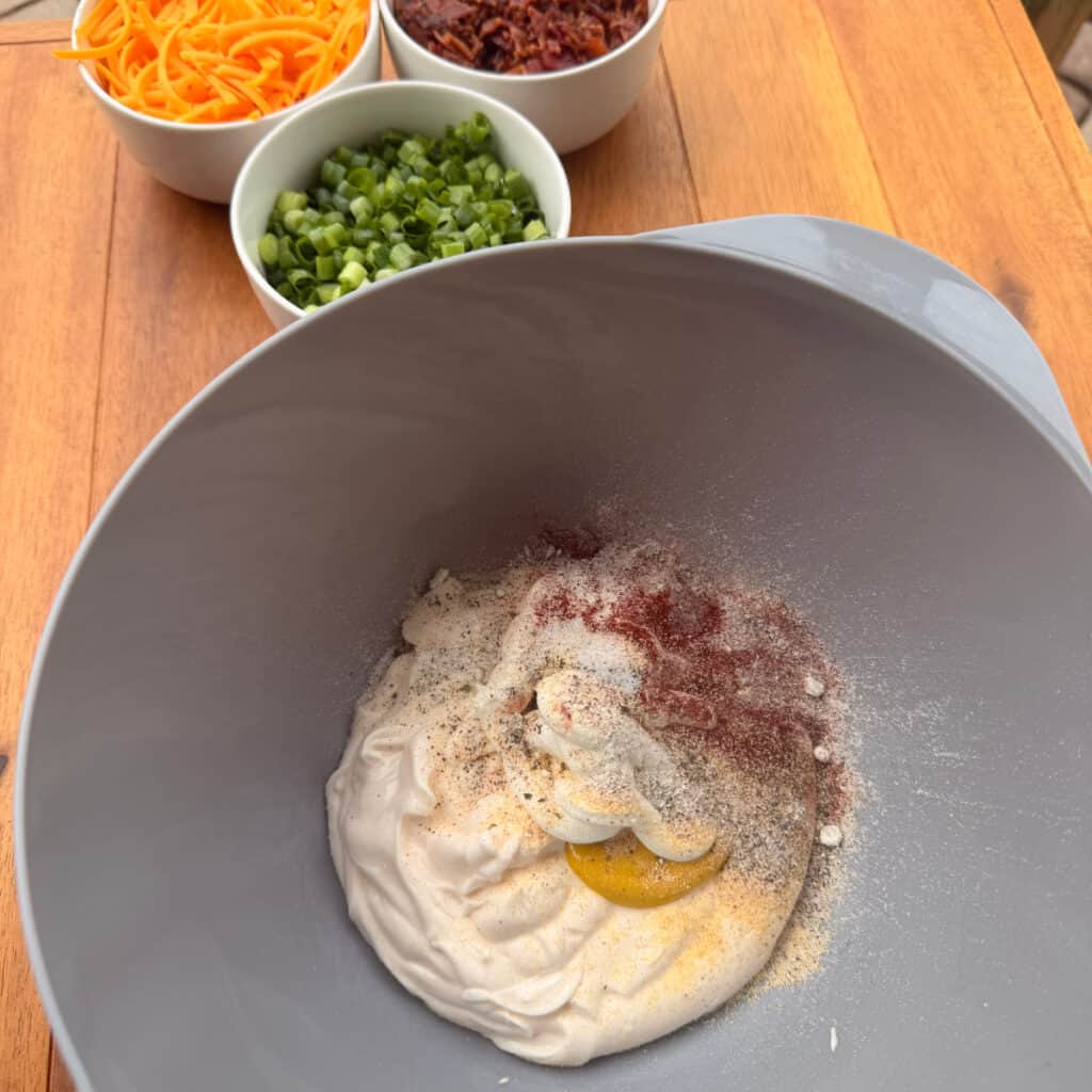 Mayo, mustard, seasonings in a bowl