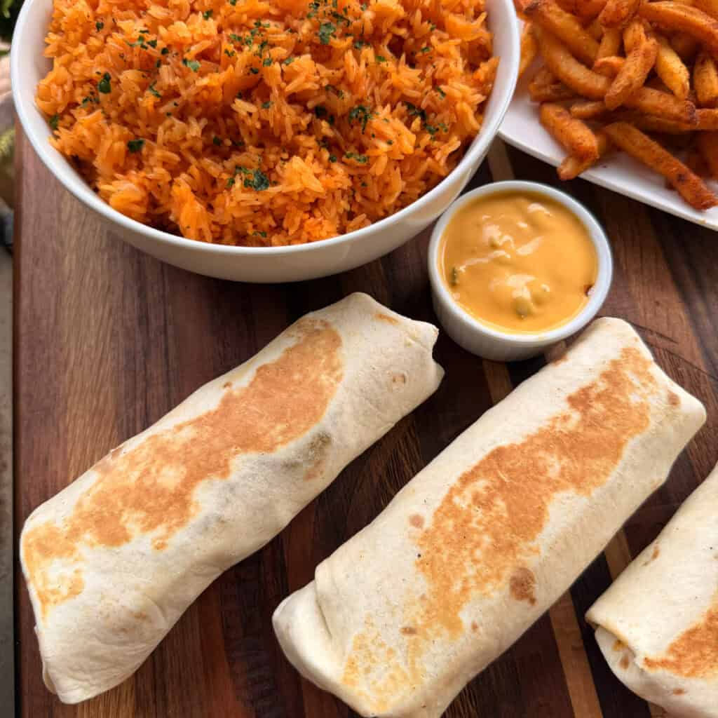 Loaded burritos, rice, and nacho fries
