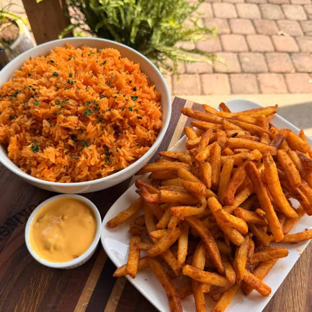 Loaded Nacho fries, nacho cheese, and rice