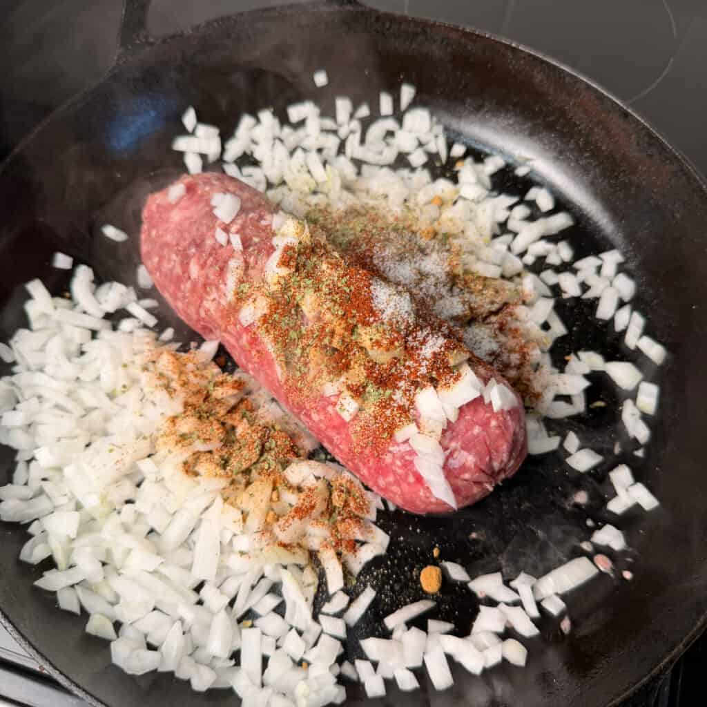 Ground beef, onions, taco seasoning in skillet
