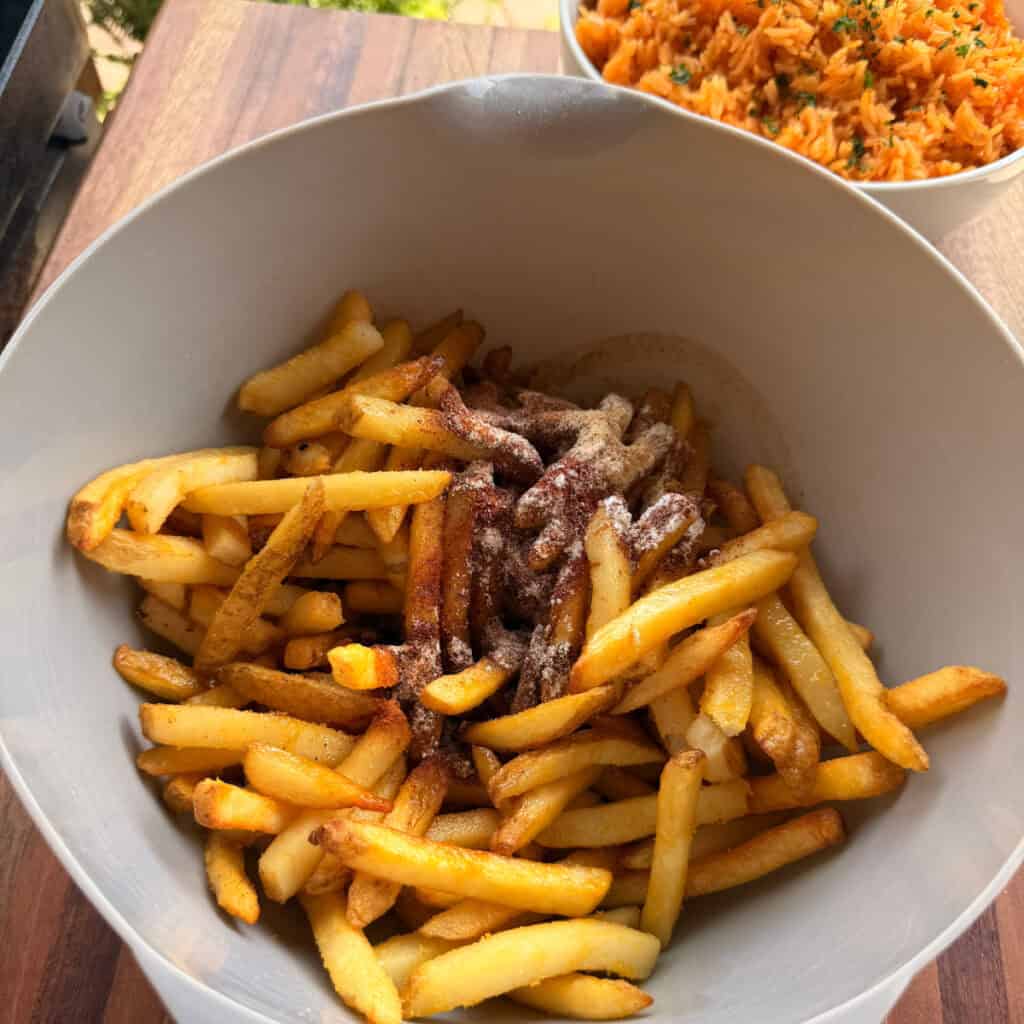 Fries with seasonings in a bowl