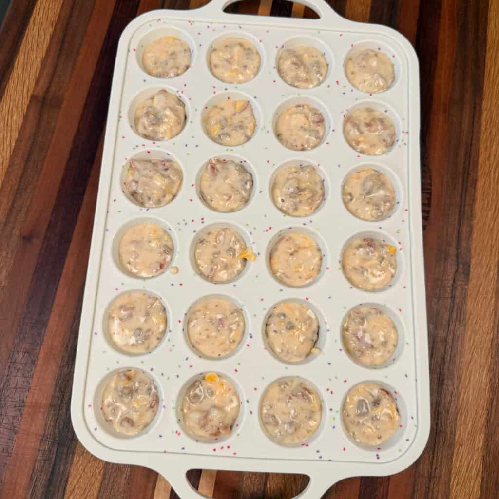Pancake batter in mini muffin pan