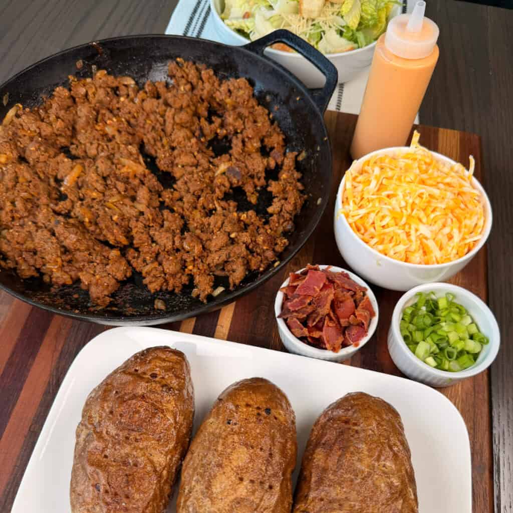 Loaded Cheeseburger Potato toppings (beef, cheese, bacon, onions, burger sauce)