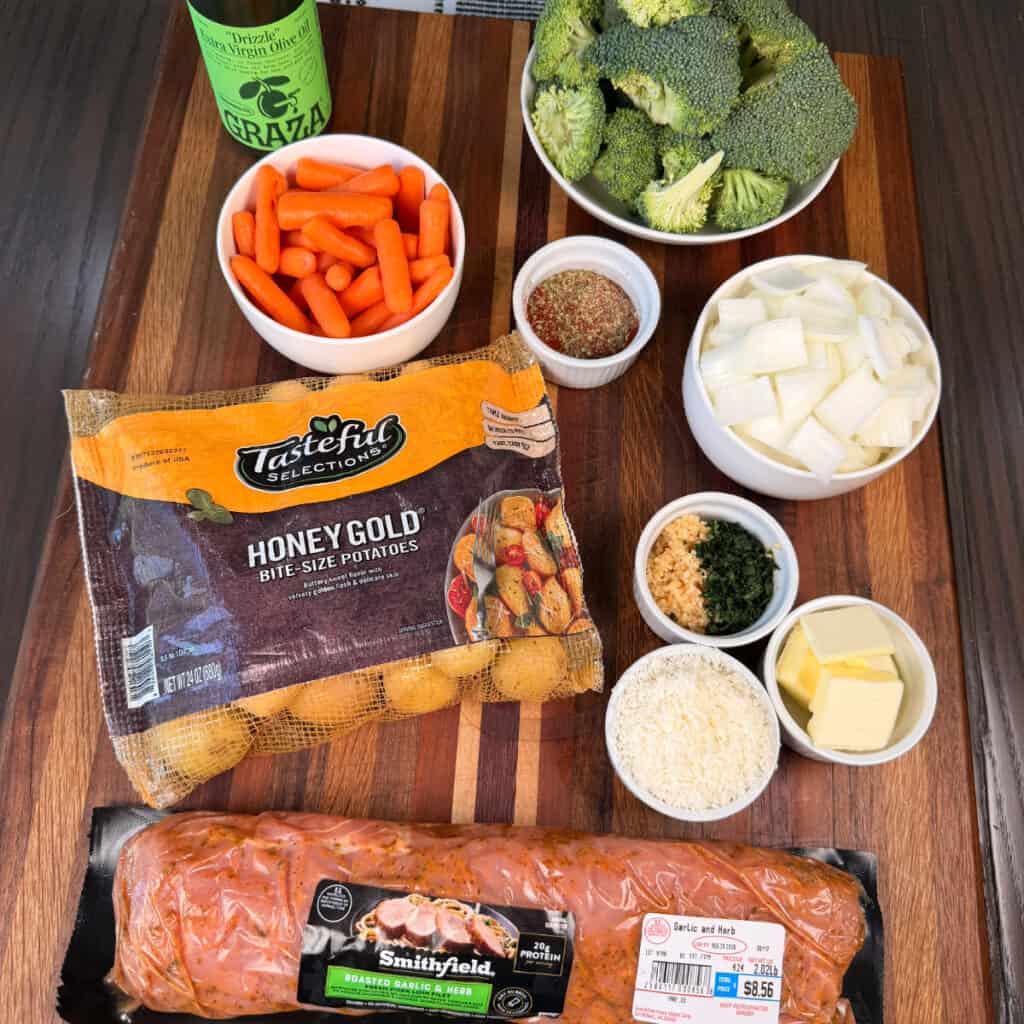 Ingredients - pork tenderloin, potatoes, carrots, broccoli, onions, garlic, butter, Parmesan cheese