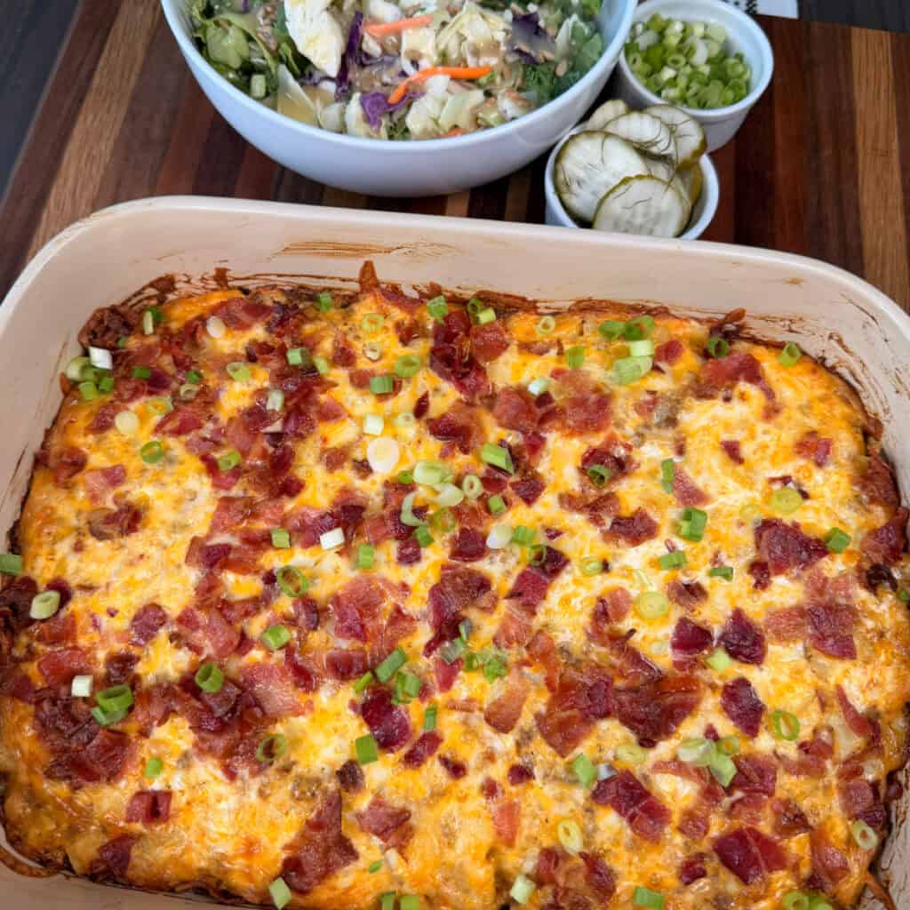 Ground beef potato casserole topped with green onions