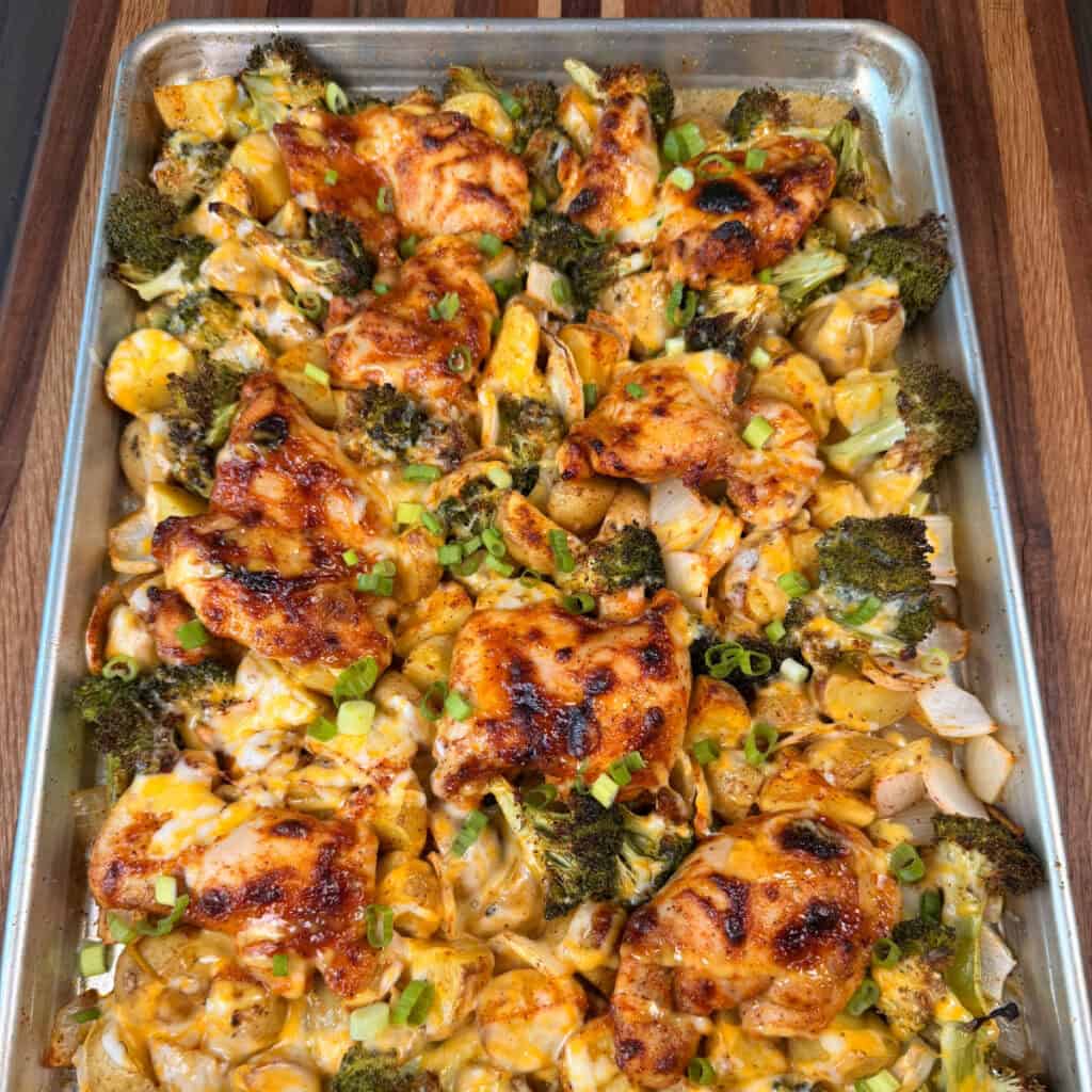 Honey Mustard Chicken Thighs with cheesy potatoes, broccoli, onions