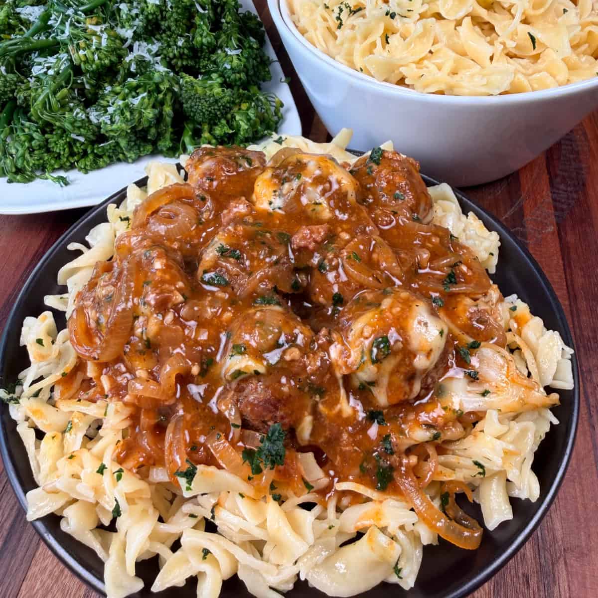 French Onion Meatballs over egg noodles with broccoli